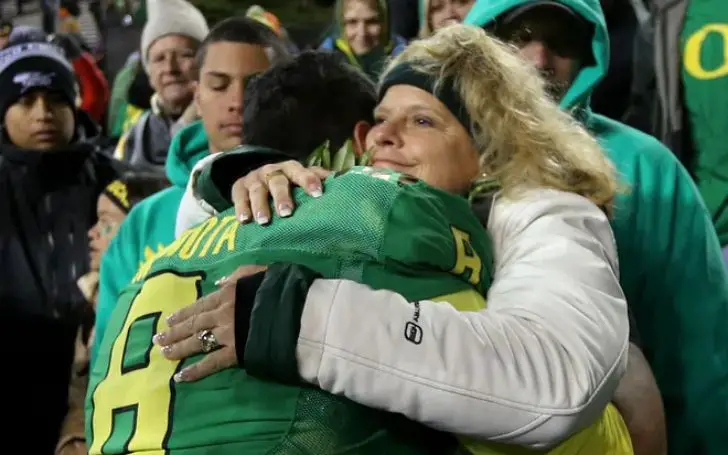 Alana Mariota hugging her son