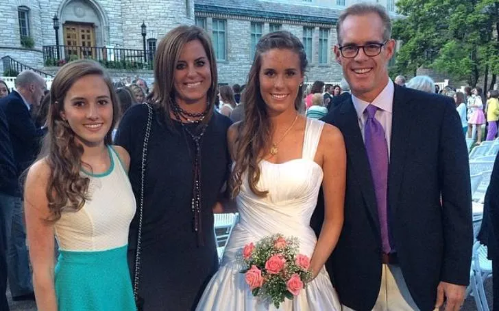 Ann Archambault with her ex-husband and daughters