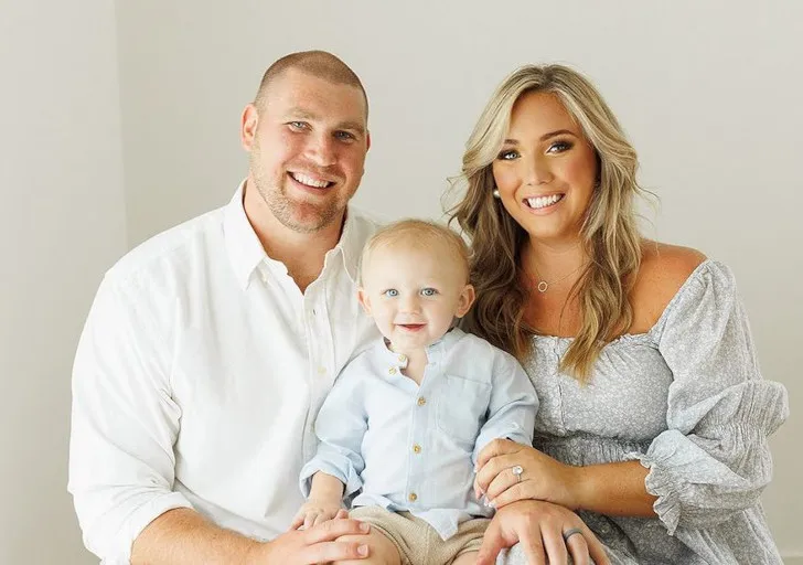 Max Scharping and his wife, Cassidy with their son.