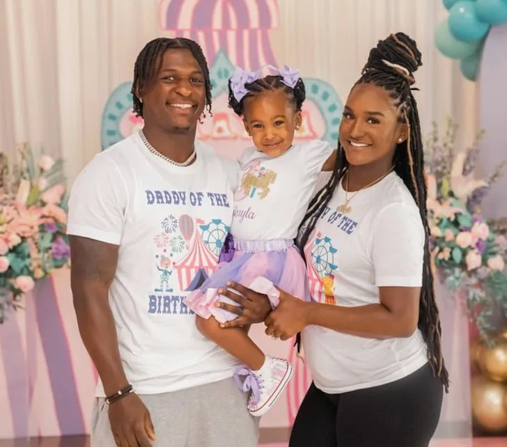 Mike Hilton and Chassidy Hilton with their daughter