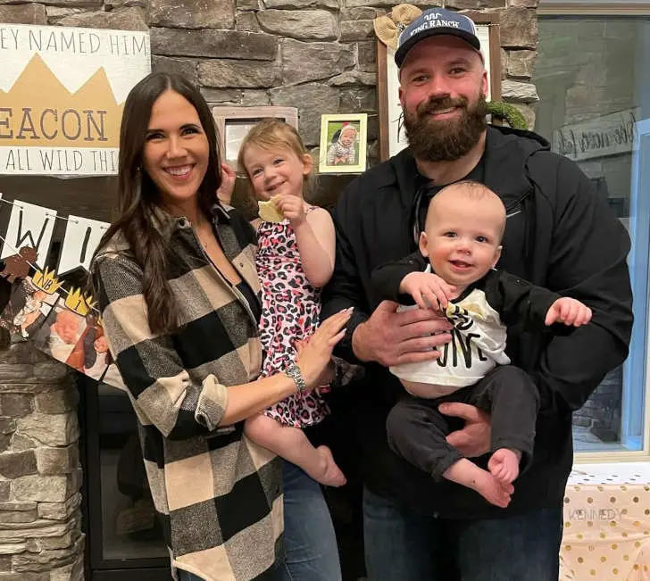 Mitch with his wife, Caitlin and their children