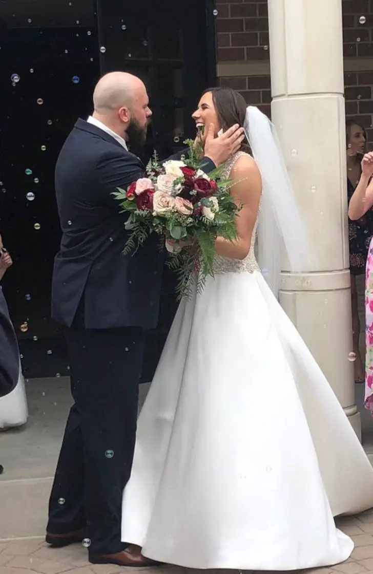 Mitch Morse and his wife, Caitlin Wilson Morse. They got married in 2018