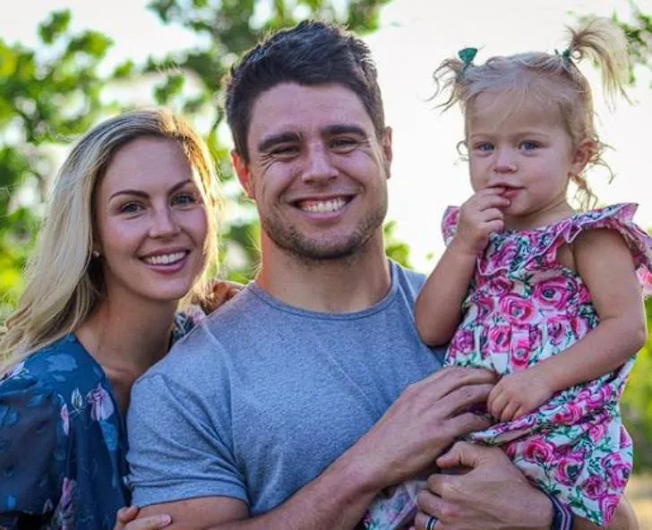 Blake Martinez with his wife and daughter.