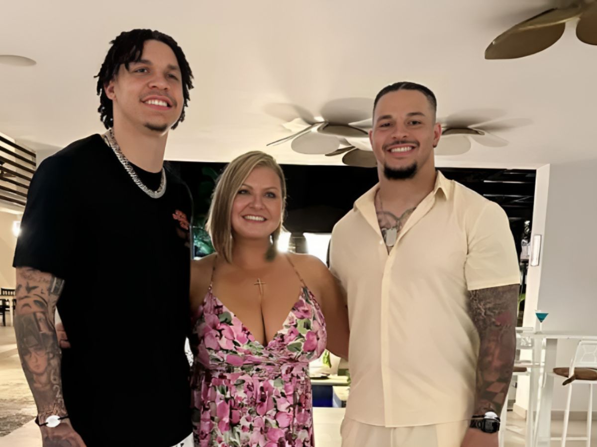Wide Receiver, Christian Watson with his mother and older brother