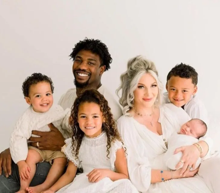 Jerry Hughes Jr with his wife and their children (1)