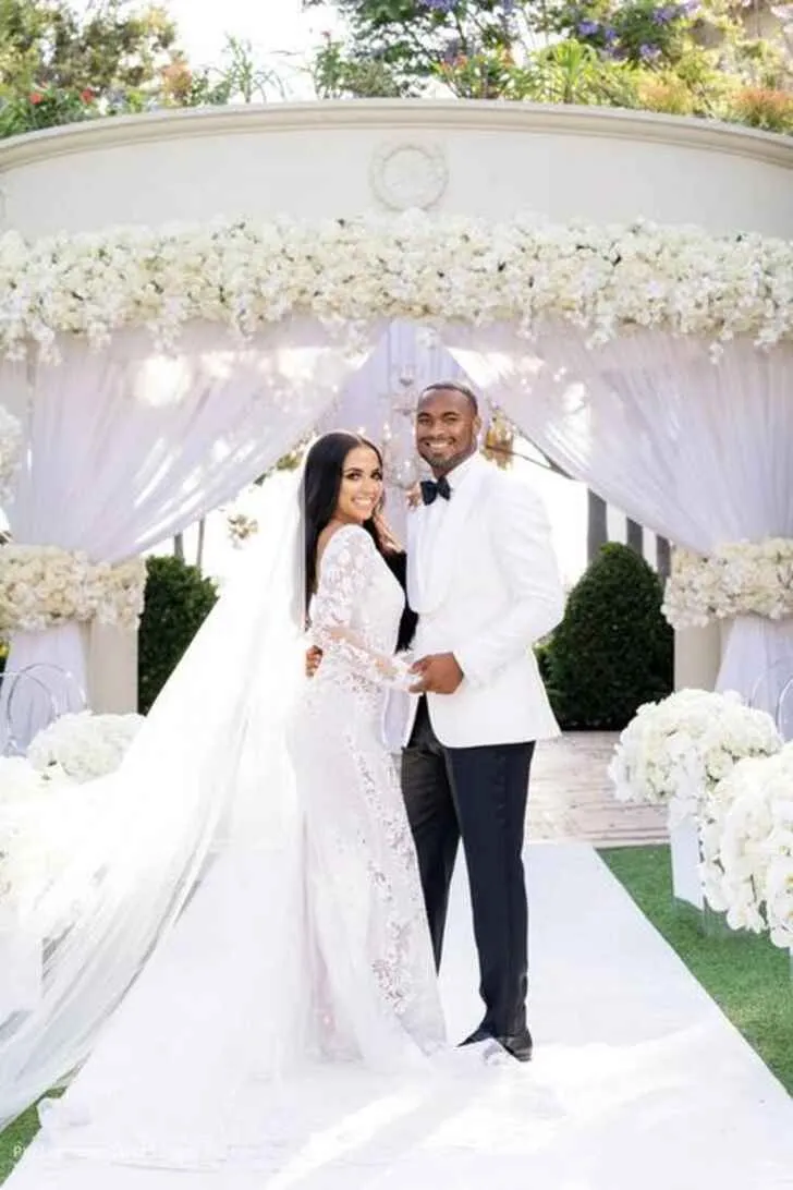 Robert Woods with his wife Alexandra Barbee at their wedding