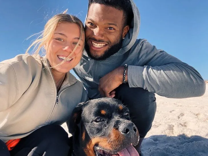 Nico Collins and his girlfriend Sam Roy with their dog