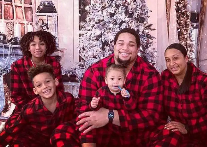 Al Woods with his wife and kids