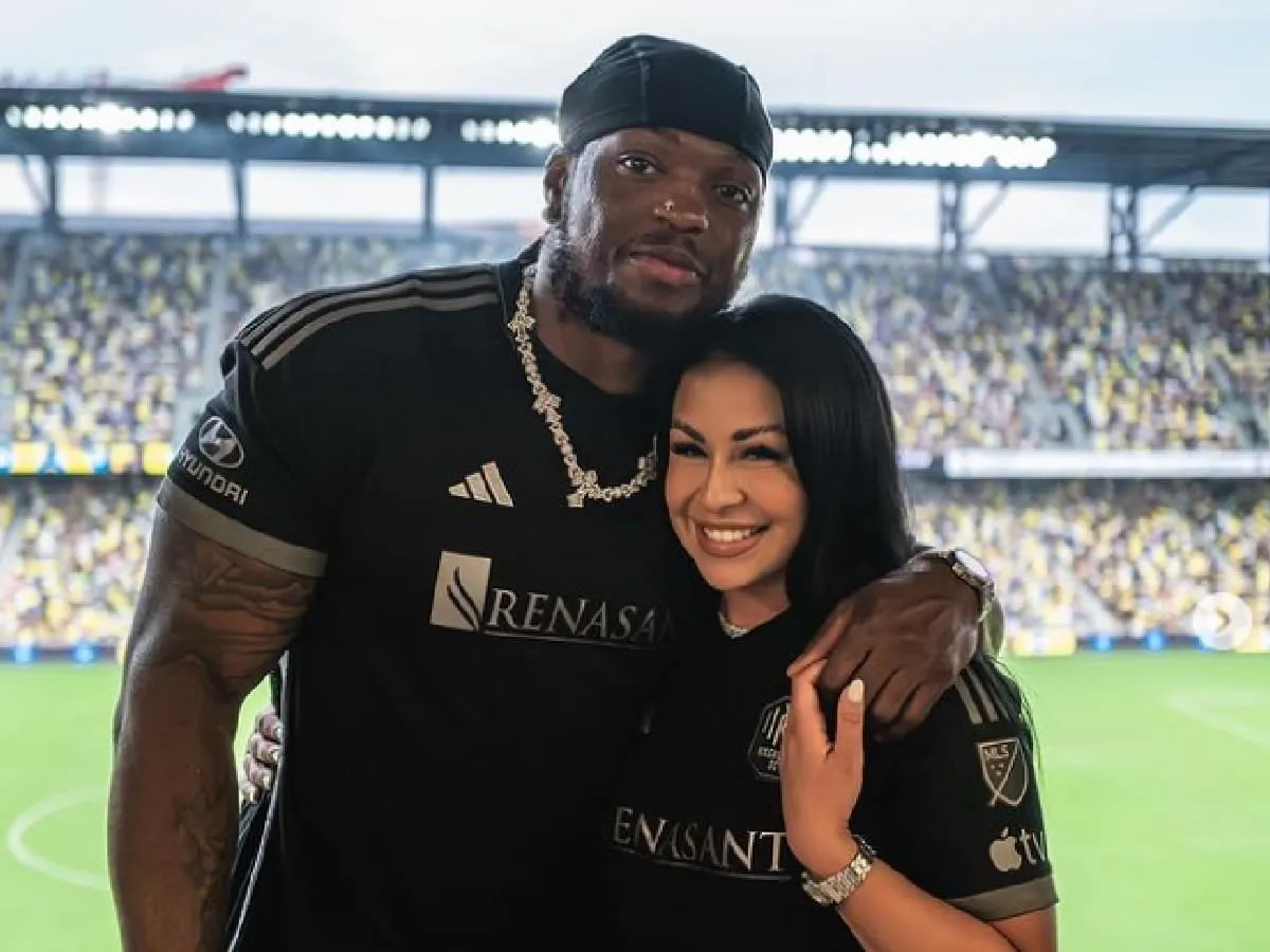 Derrick Henry and his girlfriend Adrianna Rivas at the stadium