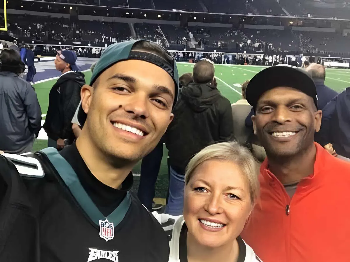 Mack Hollins with his parents at a football game