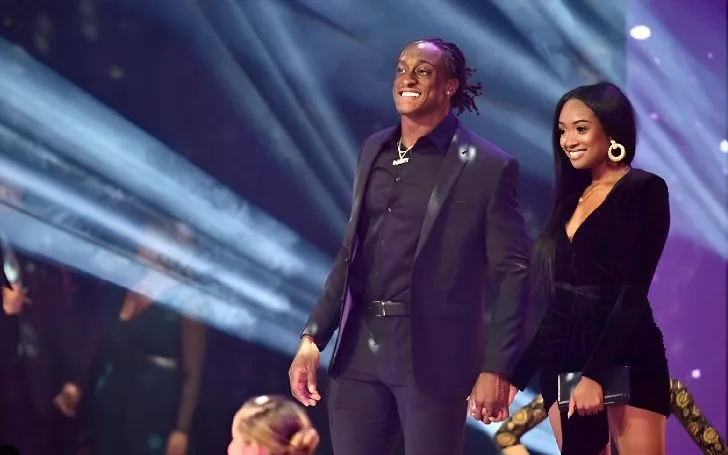 Terrell Edmunds with his girlfriend Kayla Brianna Smith on a stage