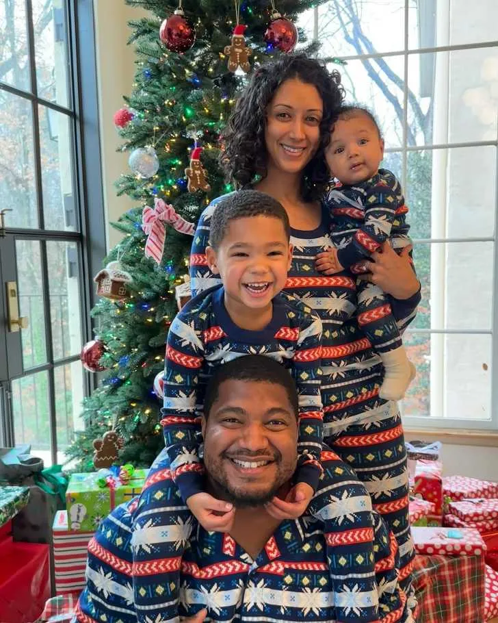 Calais Campbell with his wife and children