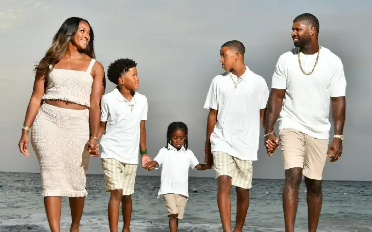 Devin Hester with his wife Zingha Hester and their three children at the beach