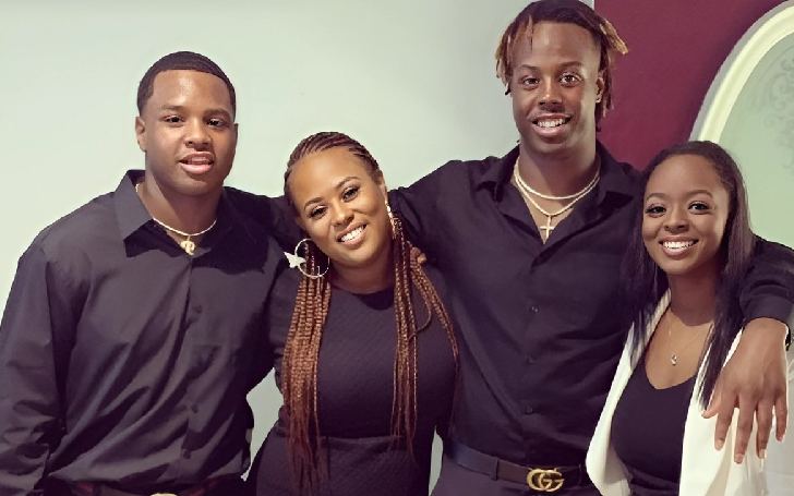 Travis Etienne Jr. with his brother Trevor Etienne and two sisters