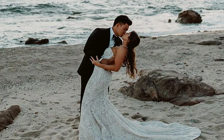 Younghoe Koo and his wife Ava Maurer at their wedding