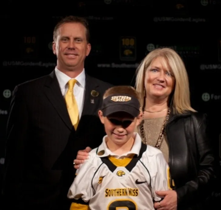 Terri Monken with her husband and son.